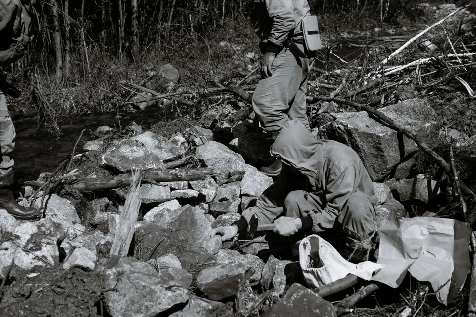 Geologists conducting field studies outdoors